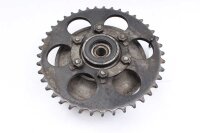 Takapyörän navan ketjupyörän pidike...