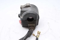 Ohjaustangon kytkimen ohjaustangon kiinnitys vasemmalla...