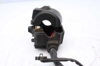 Ohjaustangon kytkimen ohjaustangon kiinnitys vasemmalla...