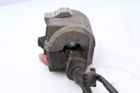 Ohjaustangon kytkimen ohjaustangon kiinnitys vasemmalla...