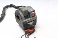 Ohjaustangon kytkimen ohjaustangon kiinnitys vasemmalla...