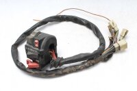 Ohjaustangon kytkimen ohjaustangon kiinnitys vasemmalla...