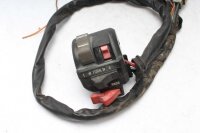 Ohjaustangon kytkimen ohjaustangon kiinnitys vasemmalla...