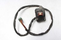 Ohjaustangon kytkimen ohjaustangon kiinnitys oikealla...