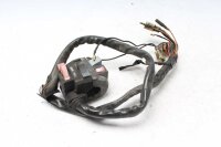 Ohjaustangon kytkimen ohjaustangon kiinnitys vasemmalla...