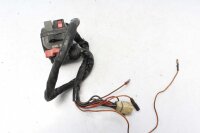 Ohjaustangon kytkimen ohjaustangon kiinnitys vasemmalla...