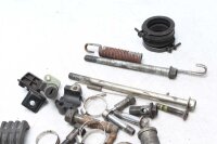 Sekoitettu paljon jäljellä olevia osia Kawasaki...