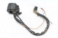 Ohjaustangon kytkimen ohjaustangon kiinnitys vasemmalla...