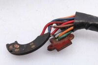 Ohjaustangon kytkimen ohjaustangon kiinnitys vasemmalla...