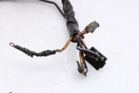 Ohjaustangon kytkimen ohjaustangon kiinnitys oikealla...