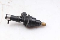 Ruiskutussuutin ylhäällä edessä...