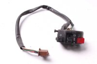 Ohjaustangon kytkimen ohjaustangon kiinnitys oikealla...