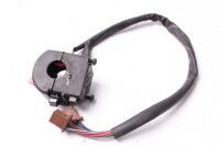 Ohjaustangon kytkimen ohjaustangon kiinnitys oikealla...