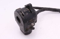 Ohjaustangon kytkimen ohjaustangon kiinnitys vasemmalla...