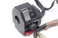 Ohjaustangon kytkimen ohjaustangon kiinnitys vasemmalla...