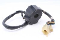 Ohjaustangon kytkimen ohjaustangon kiinnitys vasemmalla...