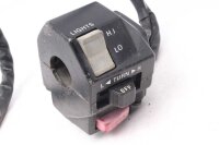 Ohjaustangon kytkimen ohjaustangon kiinnitys vasemmalla...