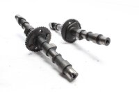 Nokka-akseliparin ohjausakselin venttiilikoneiston...