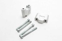 Ohjaustangon korotuspalan ohjaustangon kiinnitysruuvit...