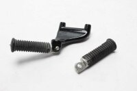 Jalkatukijärjestelmän pidike takana vasemmalla...