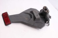 Rekisterikilven pidike heijastavalla taustavalolla...