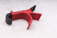 Bremsegrebets låsemekanisme holder parkeringsbremse...