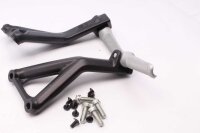 Sistema de reposapiés de pasajero trasero...