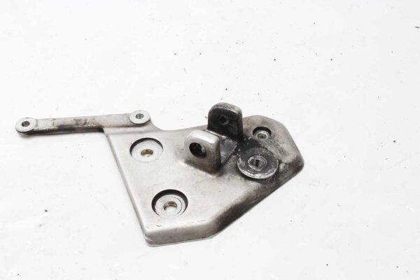 Fotstödsfäste, bärplatta, fram vänster, fäste Triumph Tiger 1050 115NG 07-13