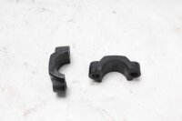 Ohjaustangon puristimen suojus ohjaustangon kiinnitys...