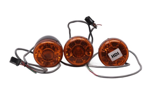 Set ronde indicatoren, zwarte en oranje behuizingen met Harley-Davidson universell