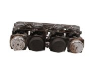 Banc de carburateurs à quatre papillons des gaz...