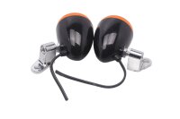 Par orange blinklys, sort forkromet hus, holder...