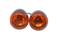 Pair of orange and black turn signals, left and right,...