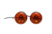 Pair of black and orange round universal indicators...