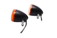 Pair of black and orange round universal indicators...