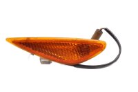 Fram höger blinkers, orange hölje, belysning...