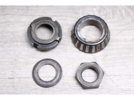Steering head bearing slices for the fork bridge at the...
