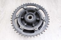 Takapyörän navan ketjupyörän pidike...