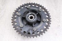 Takapyörän navan ketjupyörän pidike...